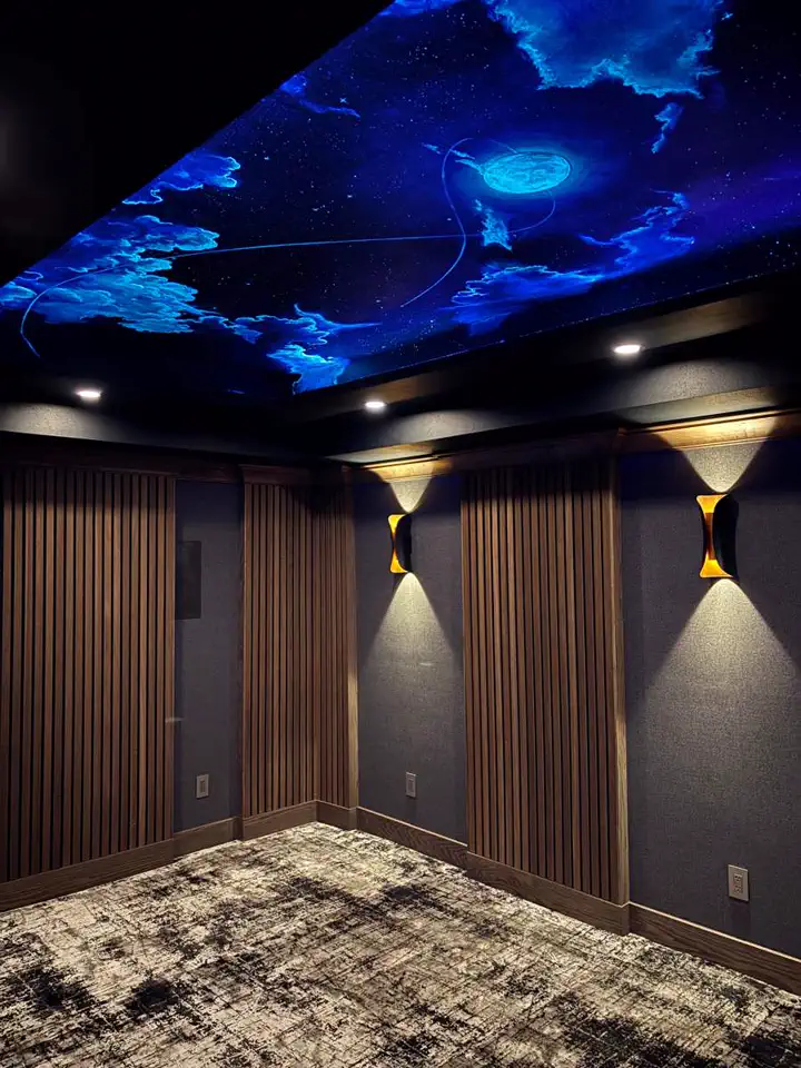 Completed custom entertainment room by Comfort Creators